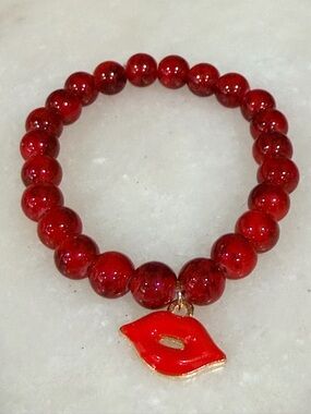Women's Red Beaded Bracelet with Lip Charm